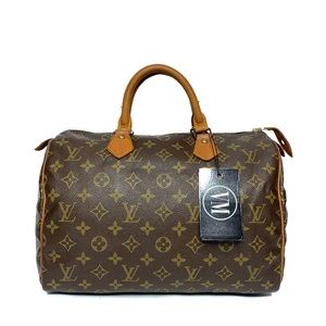 LOUIS VUITTON • SPEEDY 30 BAG